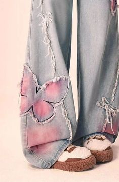 Rock these Distressed Pink Butterfly Jeans 🦋 and make a statement with their unique distressed design. These cute and pretty jeans feature edgy pink butterfly designs that will surely turn heads. Be bold and playful with your fashion choice! Size Chart: Size Waist (cm) Hip (cm) Length (cm) Waist (in) Hip (in) Length (in) S 63 94 100 24.80 37.01 39.37 M 67 98 101 26.38 38.58 39.76 L 71 102 102 27.95 40.16 40.16 XL 75 106 103 29.53 41.73 40.55 Description: Item Type: JeansJeans Style: High Waist Wide Leg PantsClosure Type: Zipper FlyMaterial: Cotton/LinenElasticity: Slight StretchLength: Full LengthFit Type: LooseDecoration: EmbroideryOrigin: CN Thickness: Regular Butterfly Cutout Jeans, Butterfly Core Outfits, Cool Jeans Design, Pants Design Ideas, Jeans With Patterns, Artsy Jeans, Jeans With Hearts, Pink And Blue Outfit, Butterfly Clothing