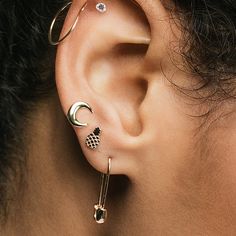 Try these edgy safety pin hoop earrings in 18K gold or sterling silver. Kris Nations safety pin earrings come packaged in our signature glass bottle. Punk Rock 80s, Pin Earrings, Safety Pin Earrings, 80s Vibes, Recycled Sterling Silver, Safety Pin, Sterling Silver Charm, Cute Earrings, Behind Ear Tattoo