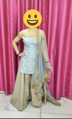 This is a three piece dress. Kurti in silk fabric with all over handwork of sequin and pearl.embroidry will be on kurti panel only.on the neck side there will be lace only Dupatta is net with lace border on all four sides. Lehenga is made by using banarsee brocade fabric.  Stitching  For stitched dresses you can chose from size chart or can message us for customization.our team will send you size chart for customization. Feel free to convo for any details to help you in your selection because customize dresses cannot be return or exchange.  Note: color may slightly vary because of different screen resolutions. We have an expert customization team .if you have any problem regarding taking measurements please convo for our help. All the measurements are rechecked before dispatch. Floor-length Raw Silk Palazzo Set With Gota Work, Designer Tissue Silk Sharara For Navratri, Diwali Dresses In Tissue Silk With Gota Work, Floor-length Raw Silk Sharara With Gota Work, Bollywood Style Sharara With Gota Work In Raw Silk, Dola Silk Sharara With Mirror Work And Traditional Drape, Bollywood Style Tissue Silk Palazzo Set With Dabka Work, Traditional Drape Dola Silk Sharara With Mirror Work, Traditional Drape Dresses In Tissue Silk With Gota Work