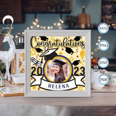 a graduation photo frame with the words congratulations and an image of a graduate's cap