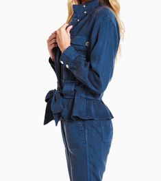 Drop shoulder jacket with front patch pockets and cinched waist. Versatile jacket for any wear is a MUST add to wardrobe! Solid color woven on relaxed fit.Body length from HPS: 23 1/2", Sleeve length: 22", Bust: 44" (Size Small) 100% TENCEL Machine wash cold, Tumble dry low Imported Long Sleeve Denim Jacket With Cargo Pockets, Blue Outerwear With Flap Pockets Relaxed Fit, Blue Relaxed Fit Outerwear With Flap Pockets, Washed Blue Long Sleeve Outerwear With Flap Pockets, Casual Washed Blue Utility Jacket With Pockets, Navy Casual Outerwear With Buttoned Pockets, Blue Outerwear With Cargo Pockets And Long Sleeves, Blue Long Sleeve Outerwear With Cargo Pockets, Blue Utility Outerwear With Side Pockets