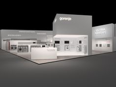 an exhibition booth with white walls and black flooring