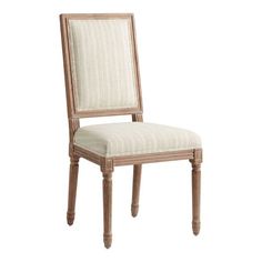 a wooden chair with a beige upholstered seat