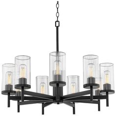 a black chandelier with clear glass shades