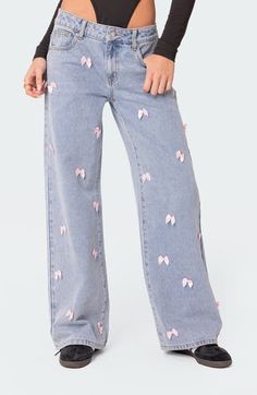 Tiny satin bows adorn the front of these wide-leg jeans crafted from nonstretch denim in a faded light wash. Zip fly with button closure Five-pocket style 100% cotton Machine wash, dry flat Imported Coquette Jeans, Jean Crafts, Teenager Outfits, Newest Trends, Jeans Pants, Wide Leg Jeans, Bottoms Pants, Diy Clothes, Aesthetic Clothes