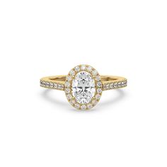 a yellow gold engagement ring with an oval cut diamond surrounded by pave set diamonds