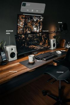 #desksetup #RAZER #Supersolid #FIFINE #Themonidesk #EDIFIER #MR4 #homeaudio #homespeakers #interiordesign #wooden #musicprints #musicrecommendation #GIVEON #HeartbreakAnniversary #R&B #darkmusic #musicaljourney #immersivemusic #tantalizingsounds #sleekdesign #mysteriousstudio  #musicanddesign #soulfulsounds #darkstudio #artisticbalance #immersiveexperience #musicaljourney Dark Desk Setup, Dark Wooden Desk, Tech Home Office, Computer Desk Setup, Home Studio Setup, Desktop Setup, Gaming Room Setup, Workspace Inspiration, Studio Setup