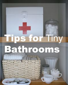 a bathroom shelf with baskets and other items on it, including an open medicine box