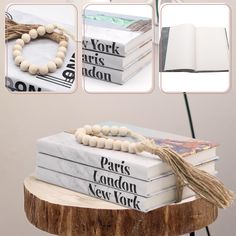 the book is stacked on top of each other with beads and tassels around it