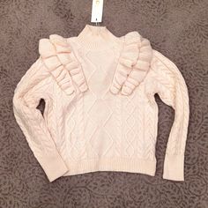 Adorable Sweater Perfect For The Holiday Season. Statement Sweater Without Being Too Busy. Easy To Coordinate. Purchased In Paris Earlier This Year. Bnwt Never Worn. Smoke, Pet And Perfume Free Home. Casual Cream Sweater With Ruffles, Cream Ruffled Sweater For Spring, Feminine Ruffled Tops For Winter, Trendy Pink Sweater With Ruffles, Feminine Long Sleeve Ruffled Sweater, Trendy Fall Sweater With Ruffles, Trendy Ruffled Sweater For Fall, Winter Cream Outerwear With Ruffles, Cream Fitted Sweater With Ruffles