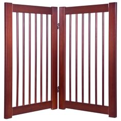 an open wooden gate on a white background