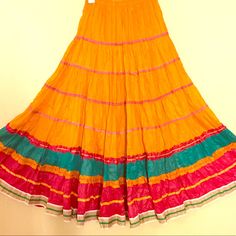 Very Fuller Skirt, Can Go With Shirt, Crop Top Or Blouse Beautiful Colorful Skirt (Pink, Orange, Gold, And Peacock Green) Nwot Excellent Condition Elastic On Waist Can Go For Xs, S, M Bollywood Style Summer Festive Skirt, Summer Festive Bollywood Skirt, Festive Flared Skirt For Summer, Flowy Skirt For Festive Summer Events, Festive Tiered Skirt For Summer, Fitted Multicolor Skirt For Navratri, Vibrant Cotton Skirt For Summer, Multicolor Festival Skirt, Pink Festive Skirt For Spring