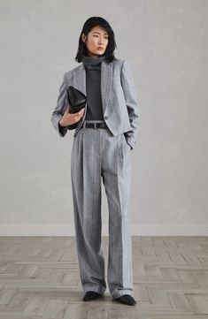 The soft, cozy effect of techno virgin wool flannel is paired with the classic tailored striped pattern. The virgin wool fibers are processed with a small percentage of synthetic fibers to achieve a comfortable and lightweight yarn. Zip closure with metal hook and backing button Front pockets Double pleat Back pockets Cropped Suit Outfit, Grey Cropped Blazer Outfit, Aw 2023, Wedding Fits, Fashion 2025, Tuxedo T Shirt, Womens Matching Sets, Cut Blazer, Wool Flannel