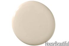 a white round object with the word house beautiful on it's bottom and bottom corner