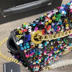 SHOP MORE LUXURY PRODUCTS HERE Description Dolce & Gabbana Multi-Colored Sequined 3.5 Shoulder Bag Muticolour For Women 10.6in/27cm DG BB7127AY0918B015 Size: 16 x 27 x 4 cm / 6.3 x 10.6 x 1.6 inches (Length x Width x Height) Front flap with hidden magnetic fasteningLight gold-plated sliding chainNappa lining with zipped pocket and flat pocketItem comes with a branded dust bag Includes dust bag.This product is of the premium quality. Multicolor Crossbody Shoulder Bag For Party, Trendy Multicolor Shoulder Bag For Party, Luxury Multicolor Bag With Chain Strap, Luxury Multicolor Bags With Chain Strap, Dior Shirt, Gucci Shirt, Louis Vuitton Shirt, Chanel Shirt, Gucci Gg Marmont