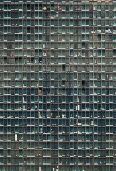 an image of a very large building made up of many different windows and glass blocks