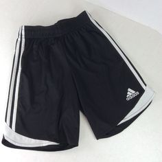 Adidas Unisex Kids ClimaCool Athletic Shorts Size S Black White Elastic waist, drawstring waist. 2010 Small snag on the back shown in the last photo. Measurements taken laying flat across are approximately: Waist: 11" un-stretched Rise: 12" Inseam: 7.5" Adidas Shorts, Basketball Shorts, Athletic Shorts, Drawstring Waist, Mens Short, Elastic Waist, Black White, Adidas, Elastic