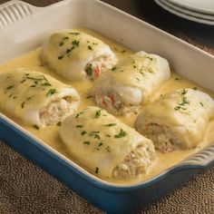 a casserole dish filled with meat and cheese