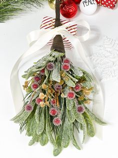 a white plate topped with a christmas tree decoration