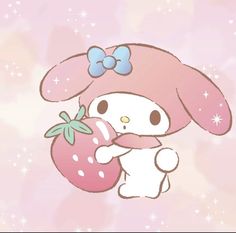 a cute little bunny holding a strawberry