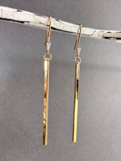 Gold Bar Drop Earrings, Luxury Everyday Linear Dangle Earrings, Golden Earrings Long, Luxury Gold-tone Dangle Linear Earrings, Luxury Dangle Linear Earrings, Long Drop Earrings Gold, Long Dangly Earrings, Gold Rectangular Linear Earrings For Everyday, Minimalist Gold Long Drop Earrings