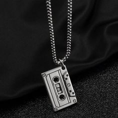 vintage tape pendant necklace easily wear with shirts or sports suits. necklace length: 60cm pendant size: 3.7*2.3cm material : stainless steel, waterproof. Streetwear Necklace, Vintage Cassette, Necklace Mens, Mens Necklace, Necklace For Men, Cassette Tape, Men's Necklace, Cassette Tapes, Chain Ring