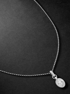 Foundrae's belcher chain necklace is threaded with an oval pendant featuring the four cardinal directions, mirrored to reflect your 'Internal Compass', the bale is studded with rows of pavé diamonds. It's handcrafted from white gold and designed to sit just below the collar bone. Timeless Oval Pendant Necklace, Luxury Oval Coin Pendant Necklace, Classic Oval Coin Pendant Necklace, Sterling Silver Oval Necklace With Coin Pendant, White Gold Oval Coin Pendant Necklace, White Gold Oval Necklaces With Coin Pendant, Tom Ford Bag, Compass Pendant, Oval Pendant