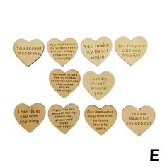 wooden heart magnets with different sayings on them