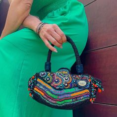 Stunning embroidered bag for a special woman. ✴ WOULD YOU LIKE TO HAVE A STRIKING ACCESSORY TO ELEVATE YOUR LOOK IN A SINGLE GESTURE? This accessory will add value to the casual, most neutral looks and more elaborate compositions, allowing them to be elevated to another level. This is a one-of-a-kind handcrafted piece that every confident and empowered woman deserves to have in her collection. ✴ FEATURES * Czech Glass Beads, Glass Seed Beads,Crystals, Rhinestones, Bugle Seed Beads. * Weight: 1.2 Multicolor Embellished Shoulder Bag For Everyday, Bohemian Rectangular Bag With Colorful Beads, Bohemian Handheld Embellished Bag, Festival Bags With Multicolor Embroidery And Beaded Details, Festival Bags With Multicolor Embroidery And Beads, Bohemian Handheld Beaded Shoulder Bag, Festival Beaded Bags With Multicolor Embroidery, Bohemian Beaded Handheld Shoulder Bag, Festival Multicolor Embroidered Beaded Bags