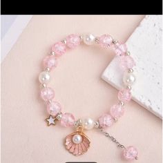 Pink Crystal Bracelet With Sea Shell Kawaii Bracelet, Pink Crystal Bracelet, Girly Bracelets, Homemade Bracelets, Crystal Bead Jewelry, Pretty Jewelry Necklaces, Bracelets Design, Clay Bracelet, Beads Bracelet Design