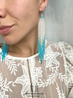 "These are bohemian bridal beaded earrings made with love for you. It also makes an excellent gift for birthdays, anniversaries, mother's day, valentine's day and more. ♡ Bead Length - 5.5\" (14 cm) ♡ Total Length - 5.9\" (15 cm) ♡ Width - 0.8\" (2 cm) ♡ Quality Czech beads If you like these white and turquoise seed bead earrings, but would like them in a different color please email me and I do special orders. I accept payments through Paypal. The colors can slightly differ from the photo becau Elegant Dangle Beaded Earrings For Summer, Elegant Summer Beaded Earrings With Dangling Beads, Elegant Colorful Beaded Chandelier Earrings For Summer, Elegant Summer Beaded Dangling Earrings, Elegant Turquoise Chandelier Earrings With Round Beads, Elegant Chandelier Earrings With Colorful Beads For Summer, Elegant Summer Chandelier Earrings With Colorful Beads, Elegant Turquoise Chandelier Earrings, Bohemian Turquoise Chandelier Earrings For Party