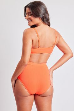 The summer vibes are immaculate in our women’s Life’s A Beach Grommet Trim Bralette Bikini swimsuit. This two-piece bathing suit features silver-tone metal rivets along the top edge and vertical ribbing. The top is detailed with a flattering rounded bralette silhouette and adjustable straps. The high-rise bottom sits up on the waist for a tummy-cinching look that gives you an hourglass shape. Style with your favorite YMI denim shorts and a breezy tank for a summer look you’ll love! Hand wash col Orange Seamless Swimwear For Sunbathing, Seamless Orange Swimwear For Sunbathing, Orange Seamless Beachwear Swimwear, Orange Seamless Swimwear For Beach, Orange Seamless Swimwear For The Beach, Seamless Orange Beach Swimwear, Bra Friendly Orange Swimwear For Swimming, Orange Bra Friendly Swimwear, Orange Bra-friendly Swimwear