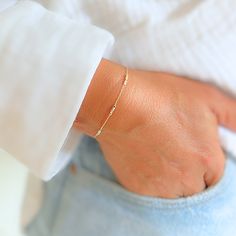 Gold Dainty Bracelet - Wynwood Shop Trendy Adjustable Gold Bracelet With Delicate Chain, Minimalist Stackable Bracelets For Friendship, Adjustable Dainty 14k Gold Bracelet, Adjustable 14k Gold-filled Bracelets For Layering, Adjustable 14k Gold Filled Bracelets For Layering, Minimalist Bangle Bracelet With Delicate Chain, Trendy Rose Gold Bracelet With Delicate Chain, Minimalist Adjustable Chain Bracelets For Layering, Dainty Tarnish-resistant Bracelets For Layering