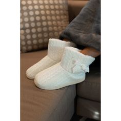 Get ready for winter with The Tessa Cable Knit Plush Bootie! This bootie is just as cuddly as it looks. The exterior is made from a plush material that ensures warmth and comfort. The stylish pattern is completed with a bow design for an added touch of sophistication. This bootie is available in either gray or Winter white, each of which adds a beautiful touch to any outfit. Whether you want to stay cozy or chic, these booties are perfect for any occasion! Cozy Winter Boots For Cold Weather, Cozy Knitted Booties With Round Toe, Cozy Winter Boots With Plush Lining, White Boots With Plush Lining For Winter, Casual Winter Booties With Plush Lining, White Winter Boots With Plush Lining, White Plush Lined Winter Boots, White Plush-lined Boots For Winter, Cozy Warm Boots For Cold Weather