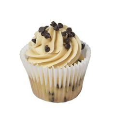 a cupcake with white frosting and chocolate chips