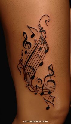 a woman's thigh with musical notes on it