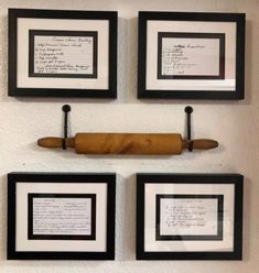 three framed pictures hanging on the wall with writing