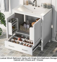 a bathroom vanity with sink and storage drawers