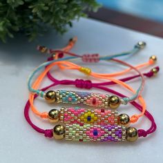 This Miyuki bracelets are made with Miyuki beads, by mixing color, to form several figures.  Each piece is 100% handmade giving you a boho style and elegance for any outfit. Each piece is unique, based on one feeling, one color, one moment, one sensation. If you want to see more from our shop press the link below: https://marierosebijoux.etsy.com   Product details: Measurements: 8" diameter  Tubular: W: 7 mm. L: 22 mm Category:  Adjustable Bracelet Finish:  Diamond Patterns Gem: Miyuki Beads THE Adjustable Multicolor Braided Bracelet With Letter Beads, Adjustable Beaded Bracelets For Jewelry Making In Summer, Adjustable Letter Beads Friendship Bracelets For Festival, Adjustable Friendship Bracelets With Letter Beads For Festival, Adjustable Stretch Bracelet With Tiny Beads For Friendship, Adjustable Tiny Beads Stretch Bracelet For Friendship, Adjustable Braided Bracelets With Colorful Beads For Friendship, Festival Beaded Bracelets With Sliding Knot And Round Beads, Adjustable Tiny Beads Friendship Bracelets For Beach