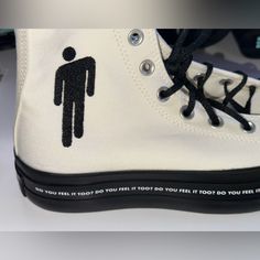 a pair of shoes with an image of a man on them