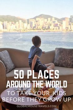 a young boy sitting on a couch with the words 50 places around the world to take your kids before they grow up