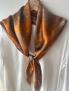 "**Apply SAVE15 promo code to get 15% off for orders of $60 or more until Feb 29th. (see shop announcement) Elegant and vintage style Chrysanthemum prints natural mulberry silk scarf with size of 88 cm x 88 cm / 35 in x 35 inch. Hand stitched edges. Warm orange background colors, with antique-styled chrysanthemums, with a subtly vintage feel. The deep brown border ties visually tie the scarf together, adding an elegant feel to the entire print. Versatile, smooth and lustrous silk charmeuse fabri Brown Border, Charmeuse Fabric, Evening Shawls, Silk Neck Scarf, Scarf Hair, Dress With Shawl, Silk Set, Scarf Silk, Dress Hairstyles