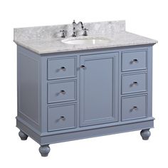 a bathroom vanity with marble top and drawers