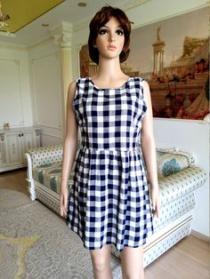 "womens dress plaid dress L Navy Blue dress Checkered dress boho dress beach dress skater dress oversize dress summer dress Babydoll dress 100% Cotton height of the woman in the photo - 180 cm Please refer to photos for details of condition. Condition: good vintage Measurements: Length: 81cm/31.9\" Bust: 100cm/39.4\" Waist: 90cm/35.4\" Hips: free Tag Size: UK-16; note The color on the pictures may vary due to monitor settings and light reflections. Ready to ship Please do not hesitate to contact Summer A-line Plaid Dress, Plaid Sundress Midi Dress For Summer, Blue Knee-length Plaid Summer Dress, Summer Plaid Dress For Vacation, Knee-length Plaid Dress For Summer Day Out, Summer Vacation Plaid Midi Dress, Casual Plaid A-line Dress, Summer Knee-length Plaid Dress For Day Out, Knee-length Sundress For Picnic