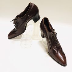 "Victorian Edwardian Shoes Leather Brown Lace Up Oxfords Theater Costume Beautiful dark brown leather antique spectator type oxfords These shoes are in amazing condition for their age they look virtually unworn! See pictures for condition. The heel reads, \" A Heel of Quality\". Inside of both shoes reads, \" 440 17363L 5761\" No size or manufacturer tags measurements: Length Heel to Toe - 9 inches Width Ball of Foot - 2.75 inches Heel Height- 2 inches Condition - The inner area of the right sho Edwardian Shoes, White Shoes Heels, Dark Brown Leather Boots, Steampunk Boots, Victorian Shoes, Granny Boots, Victorian Boots, Beaded Shoes, Wedding Boots