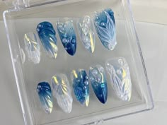 💎🌊 Ocean Dream Press-On Nail Set | Mystical Marine-Themed Almond Nails | Custom Press Ons with Pearls and Shimmer 🌊💎 Dive into the deep blue with our Ocean Dream Press-On Nail Set, a spectacular collection designed to bring the serene beauty and mystery of the ocean right to your fingertips. Featuring deep blue hues and iridescent touches, each nail is a tiny treasure trove of oceanic wonders. 🐚 Key Features & Highlights: Deep Ocean Blue Hues: Each nail features captivating shades of deep b Planet Press On Nails, Mermaid Themed Nails, Nail Art With Charms, Blue Mermaid Nails, Sea Themed Nails, Nail Ideas Blue, Nails Mermaid, Shell Nails, Ocean Nails