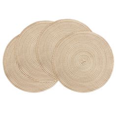 four round placemats in natural color on a white background, set of 4