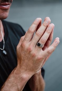 "Men Onyx Rings/ Squircle Onyx Ring/ Black Onyx Signet/ Silver Onyx Men Ring/ Onyx Ring Men/ Onyx Signet Ring Men/ Black Stone Ring Men This simple men's signet ring is made of sterling silver and black square onyx stone. On the sides of the band there are some geometrical lines in oxidized. This nice Onyx ring is a classic that matches perfectly with any look. Impressive and elegant, perfect for any occasion. You'll be amazed at how comfortable it feels on your hand. The band of the ring is roundish specially designed to not to disturb your fingers. The surface of the square is 5mm x 5mm. Urban jewelry, for those who not only want to wear special designs but also with meaning. Name of the ring: AROUNI...The journey has to feel the way you want the destination to feel. Every time we make a Silver Rings For Men Simple, Black Stainless Steel Open Ring, Black Stainless Steel Open Ring Jewelry, Black Stone Ring For Men, Black Onyx Ring Men, Stone Ring Men, Onyx Rings, Stone Rings For Men, Onyx Ring Men