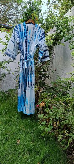 For more robes, kaftan, custom dresses  please visit our homepage- https://www.etsy.com/shop/mommyrobeclothing SALE-  BUY 1 AVAIL 10% OFF,  trackable shipping . CUSTOM MADE- AS PER YOUR HEIGHT AND FIT  All dresses are custommade- ONLY FOR YOU! . Indian Block Print / tie- dyed kaftans robe- made to measure- all customizations happily accepted! Indian Handblock print Cotton Kimono Robe, Floral Dressing Gown,Cotton Robes, Floral Kimono Jacket, Lounge wear, Beach Kimono ,Beach Dress ,Beach Cover ups Blue Bohemian Maxi Dress With Tie Waist, Blue Bohemian Cotton Robe, Bohemian Hand Dyed Blue Dress, Hand Dyed Blue Bohemian Dress, Blue Hand-dyed Beach Dress, Hand-dyed Blue Beach Dress, Floral Gown Dress, Kimono Beach, Beach Kimono