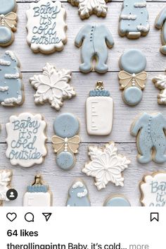 baby shower cookies are displayed on a table with the caption, it's cold outside